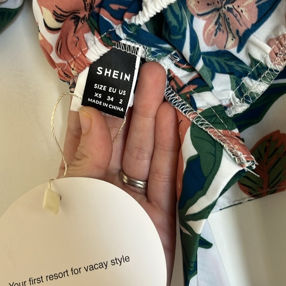 Never worn cute midriff shirt with a cute tie in the back. - Picture 4 of 8